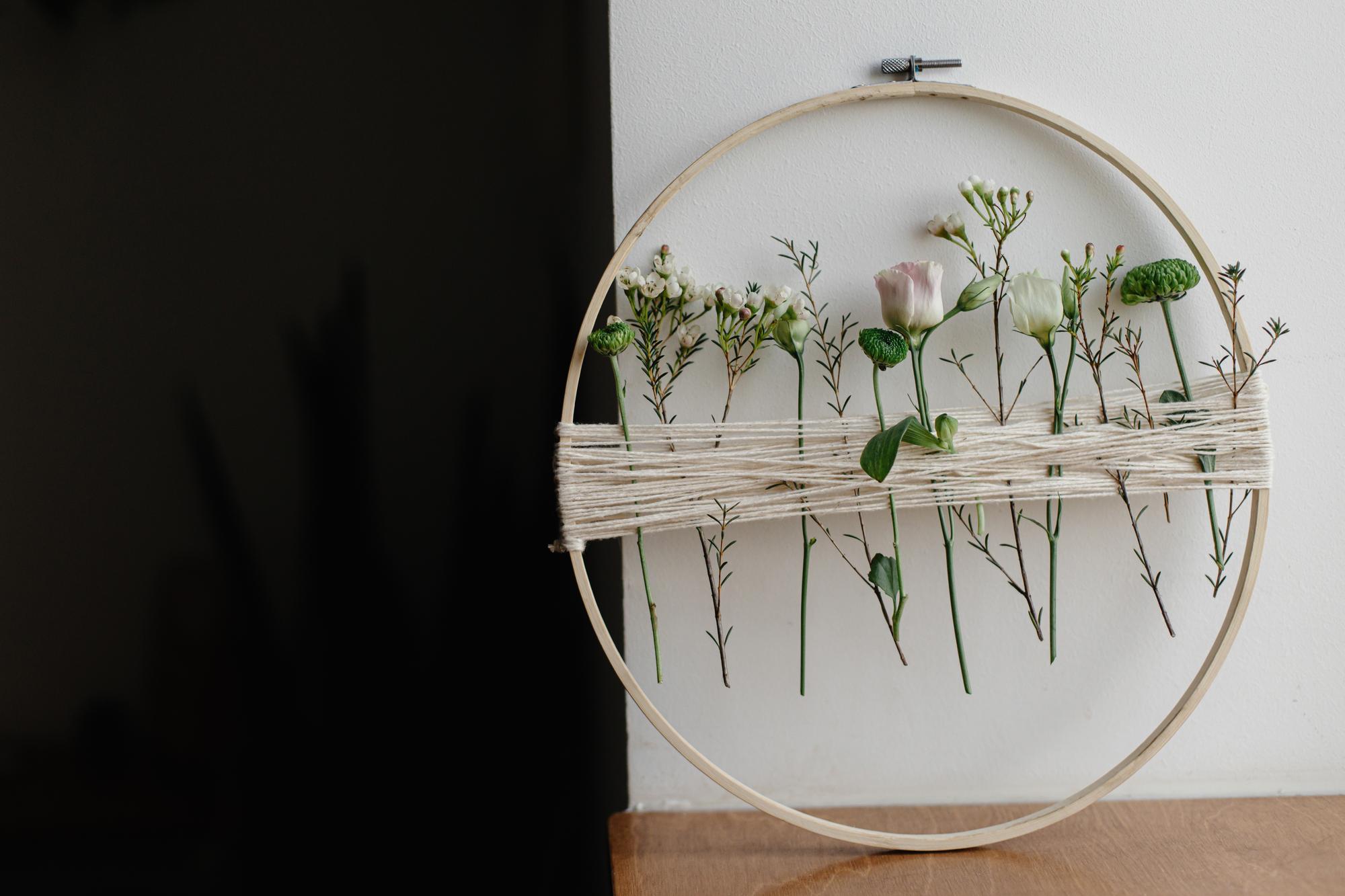 Studio doorway with embroidered pieces on display